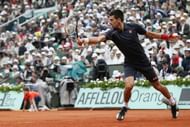 Novak Djokovic hits a return